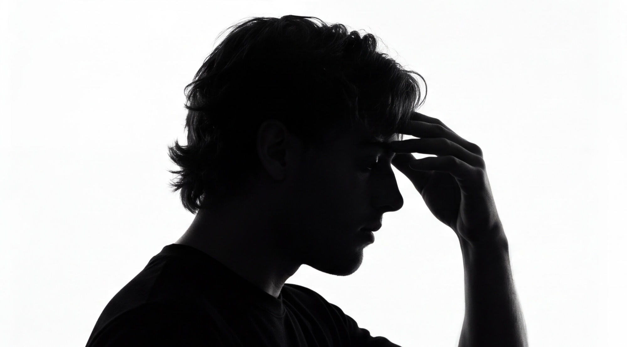 Dylan thinking in silhouette
